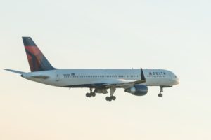 A DELTA 757-200 PLANE IN FLIGHT