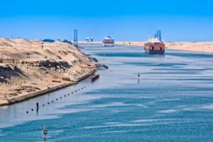 SHIPS SAIL THROUGH THE SUEZ CANAL 